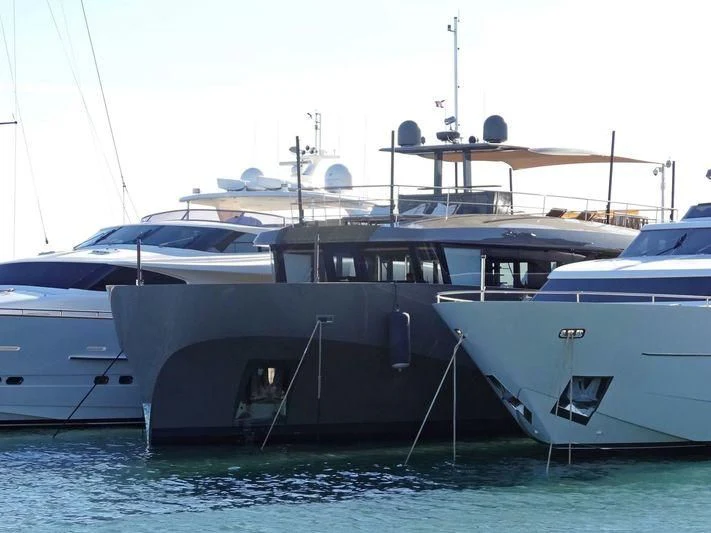 a group of boats in the water aboard KOKONUT'S WALLY Yacht for Sale