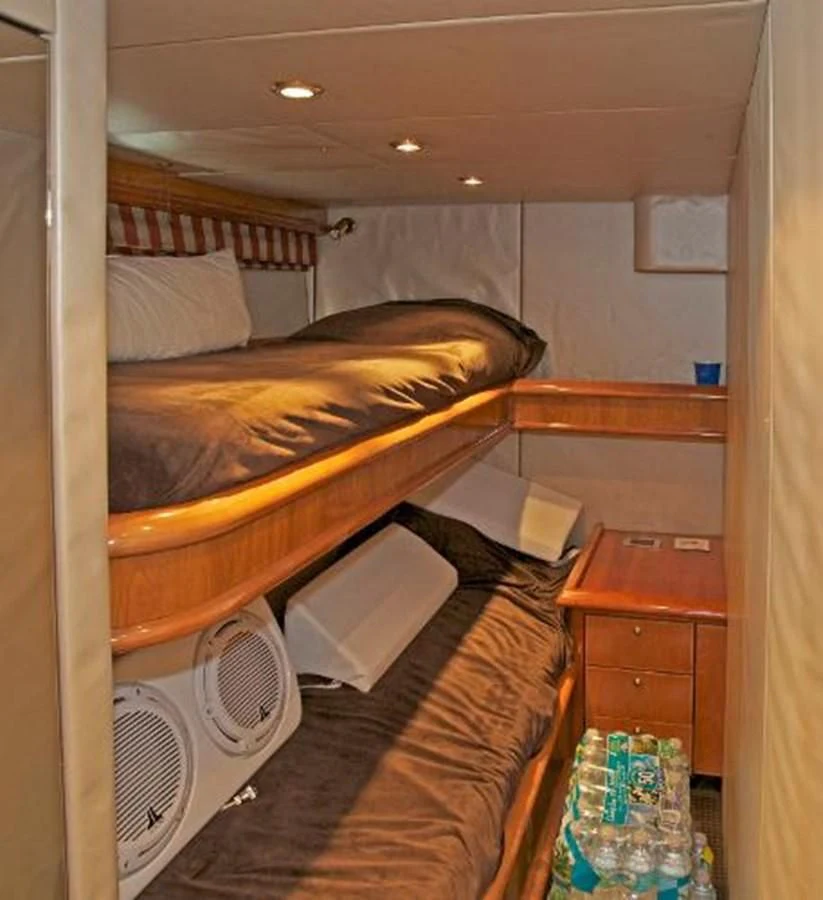 a room with bunk beds aboard H2 Yacht for Sale