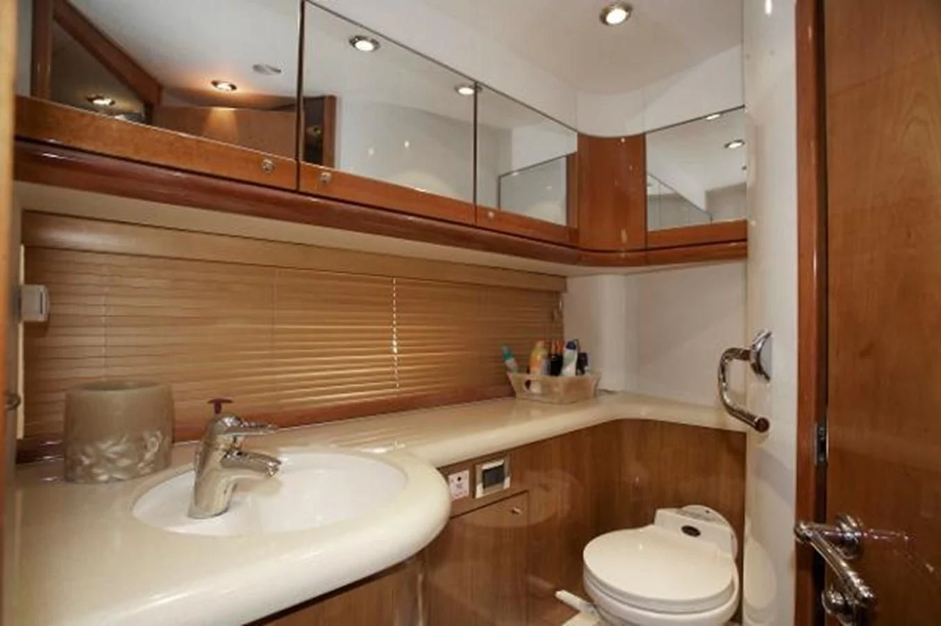 a bathroom with a sink and a toilet aboard H2 Yacht for Sale
