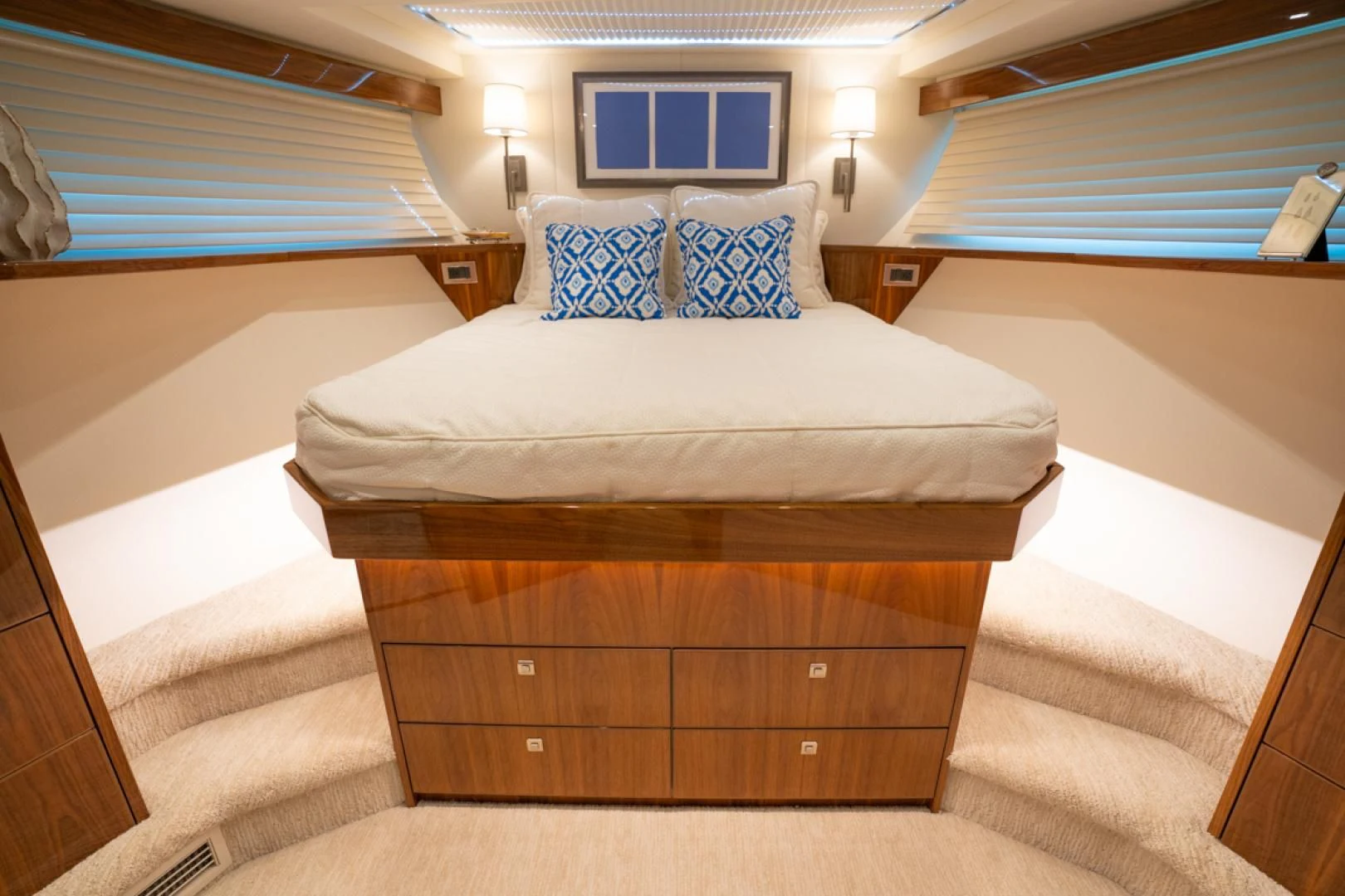 a bed with a wooden headboard aboard MAKE IT HAPPEN Yacht for Sale