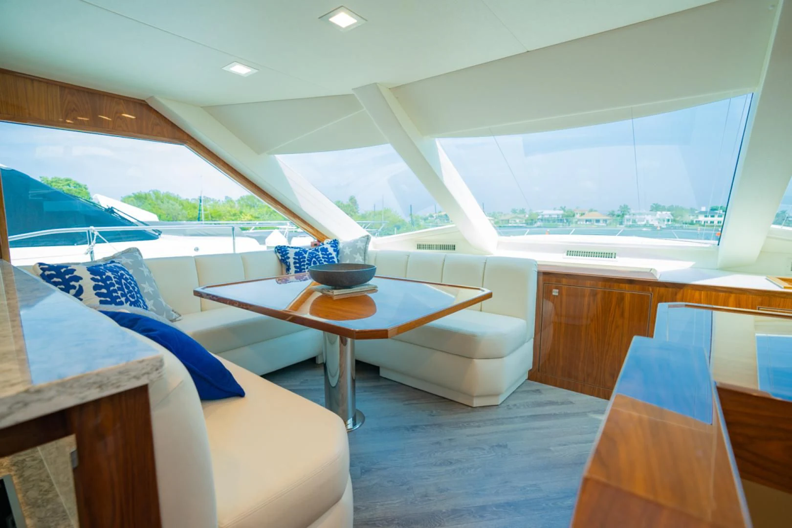 a room with a table and chairs aboard MAKE IT HAPPEN Yacht for Sale