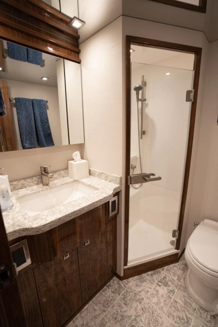 a bathroom with a standup shower aboard MAKE IT HAPPEN Yacht for Sale