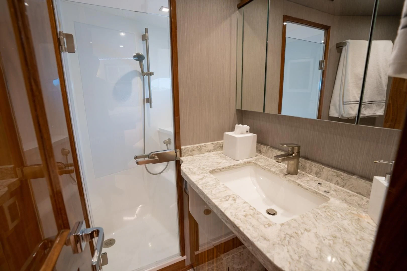 a bathroom with a sink and a shower aboard MAKE IT HAPPEN Yacht for Sale