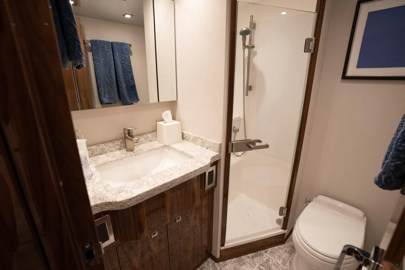 a bathroom with a sink and a shower aboard MAKE IT HAPPEN Yacht for Sale