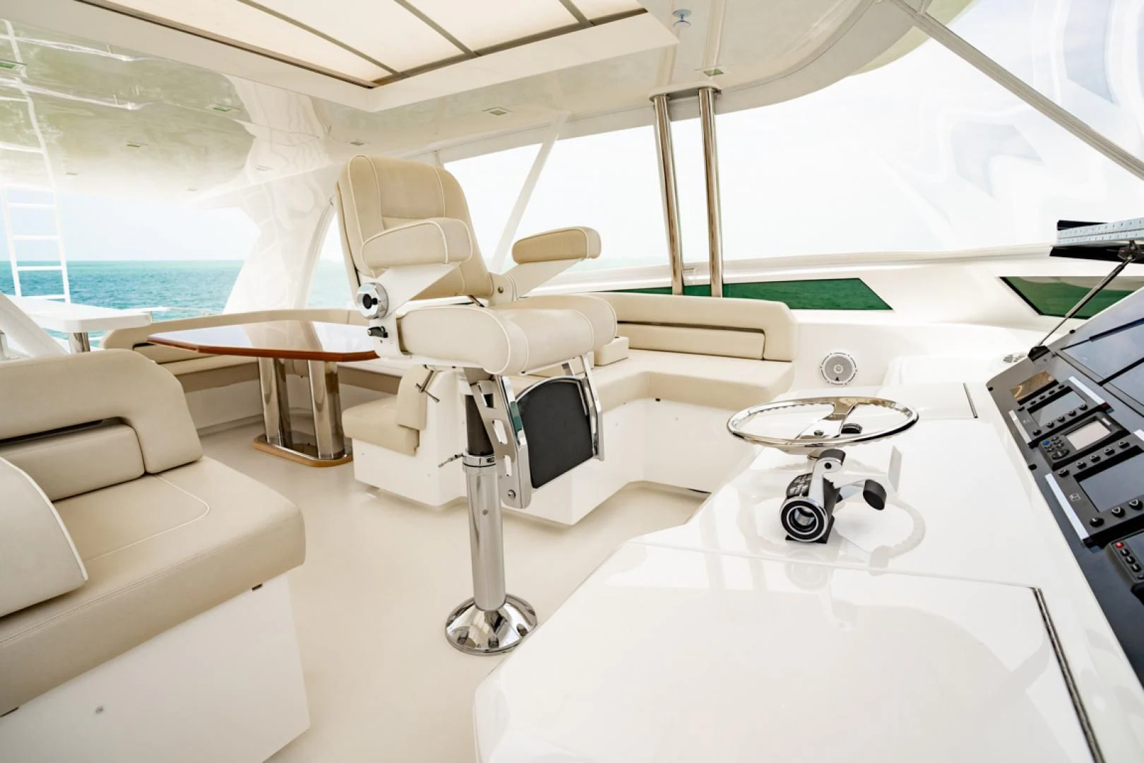 a room with a chair and a table aboard MAKE IT HAPPEN Yacht for Sale