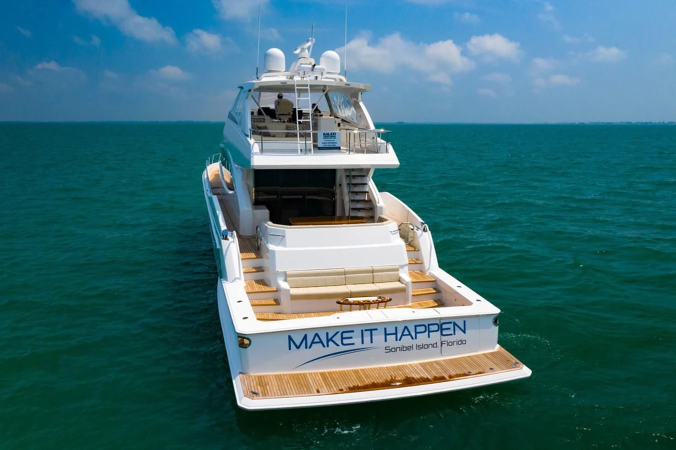 a boat on the water aboard MAKE IT HAPPEN Yacht for Sale