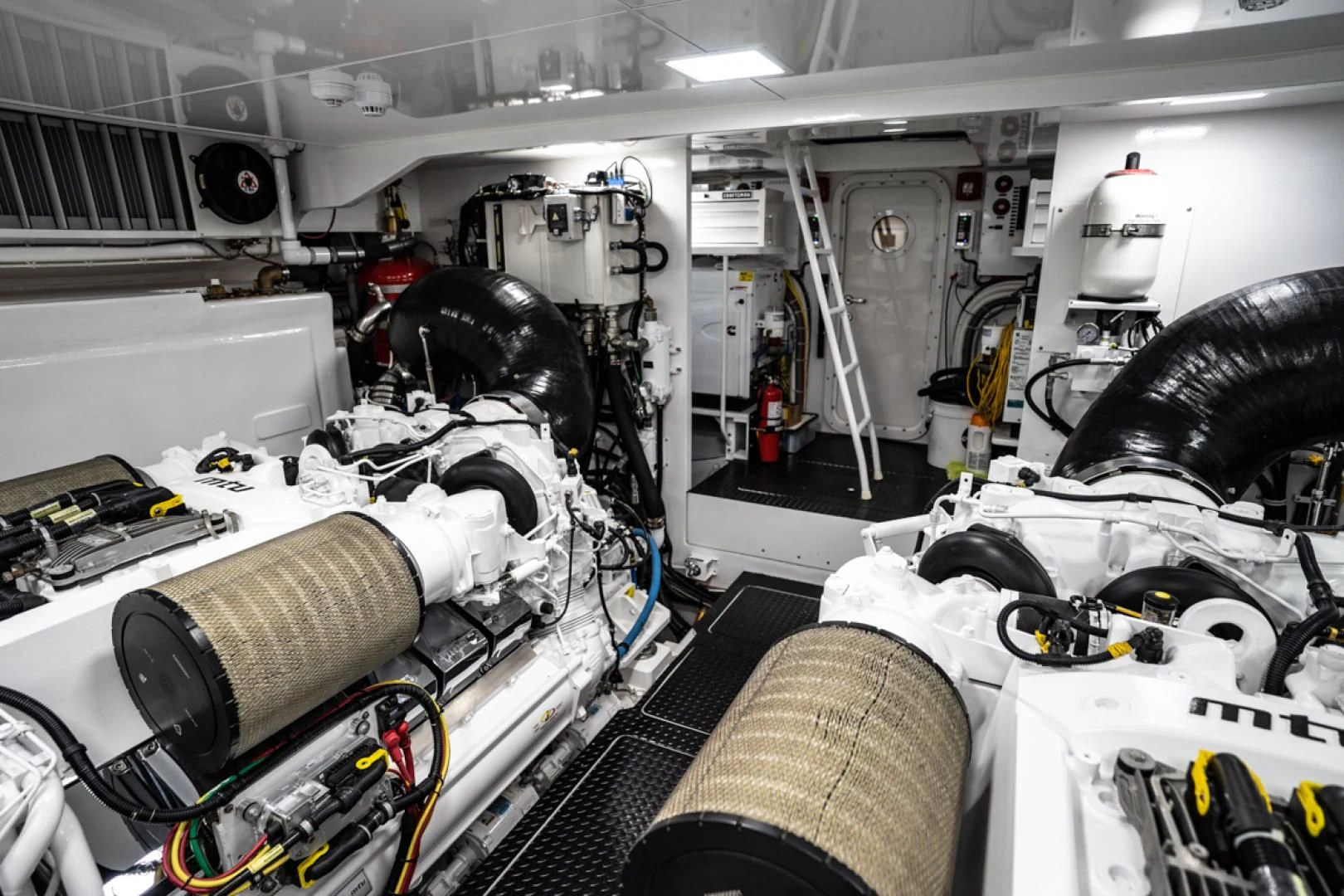 a room full of white and black machinery aboard MAKE IT HAPPEN Yacht for Sale
