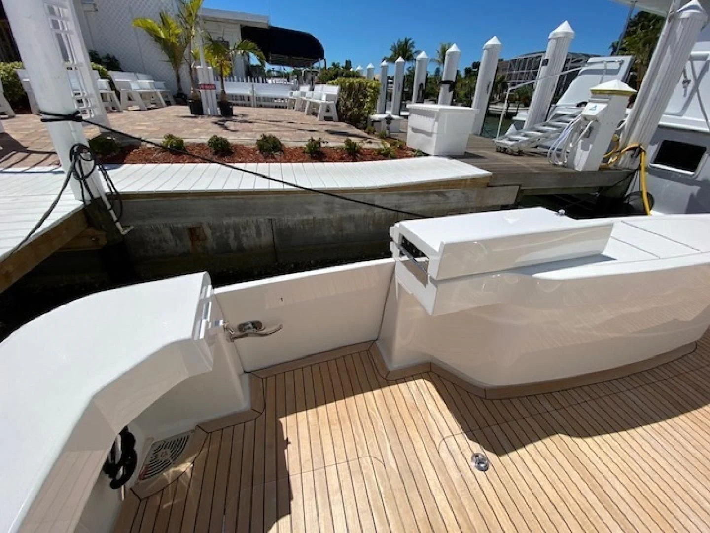 a deck with white furniture aboard MAKE IT HAPPEN Yacht for Sale