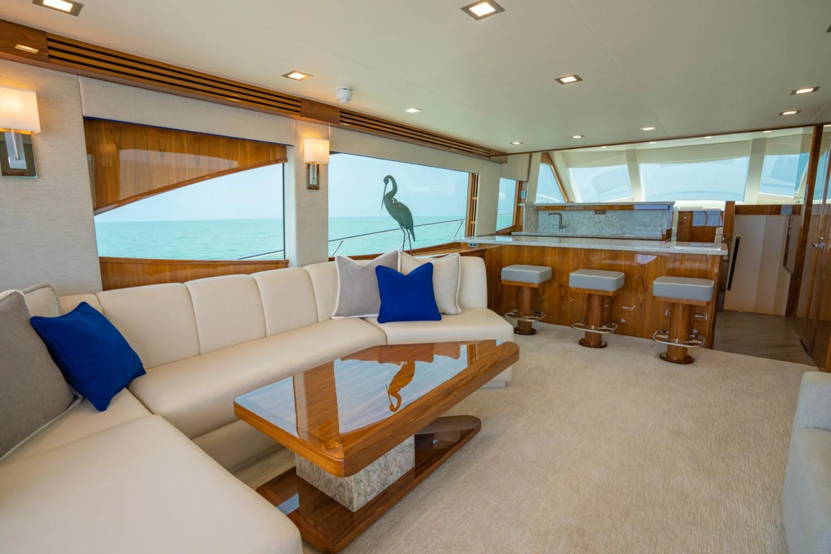 a large living room with a large window aboard MAKE IT HAPPEN Yacht for Sale