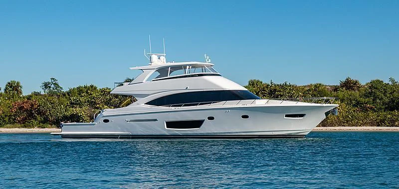a white yacht on the water aboard MAKE IT HAPPEN Yacht for Sale