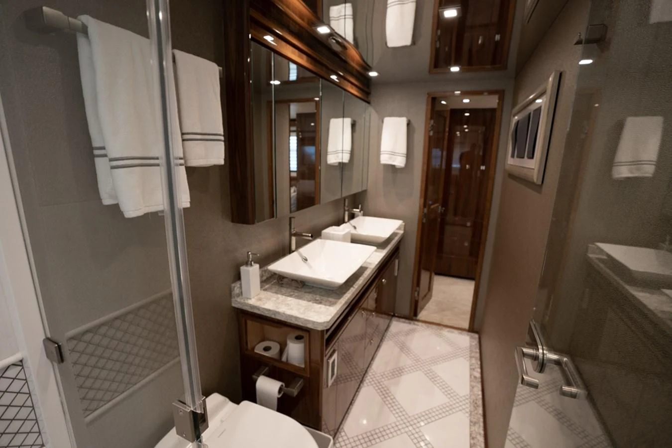 a bathroom with a sink and a mirror aboard MAKE IT HAPPEN Yacht for Sale