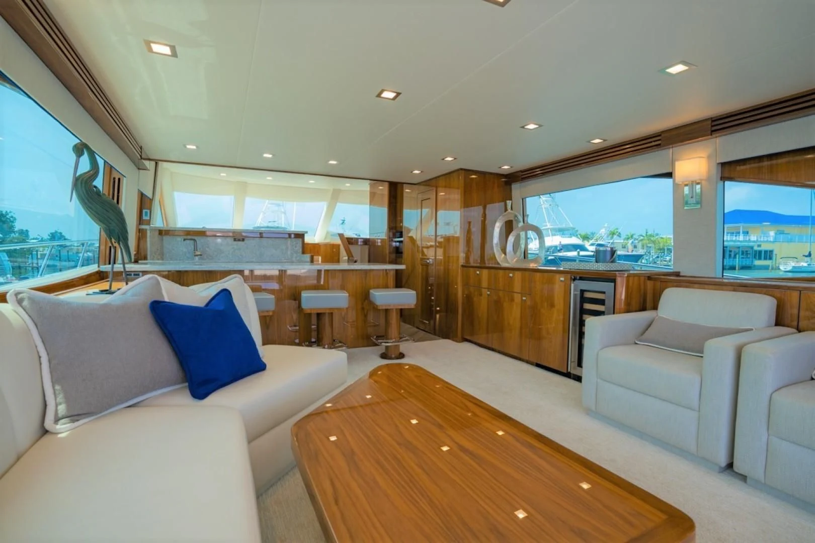 a large living room with a large window aboard MAKE IT HAPPEN Yacht for Sale