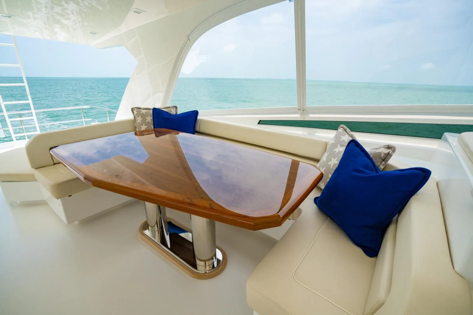 a room with a bed and pillows aboard MAKE IT HAPPEN Yacht for Sale
