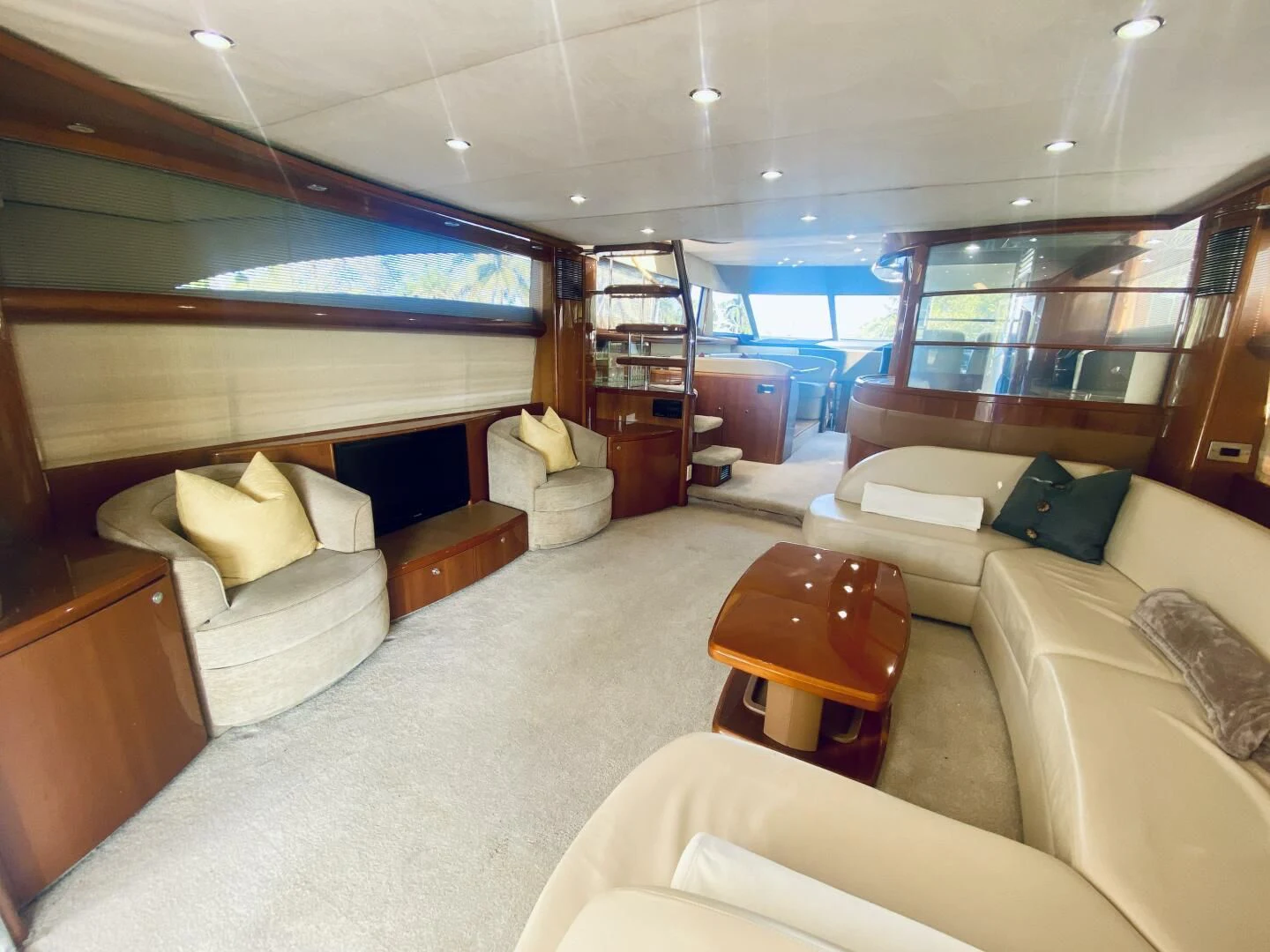 a room with a bed and a table aboard GRAND CRU Yacht for Sale