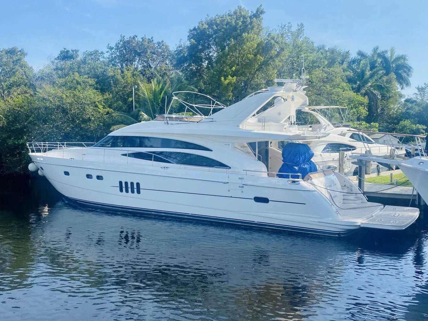 a white yacht on the water aboard GRAND CRU Yacht for Sale