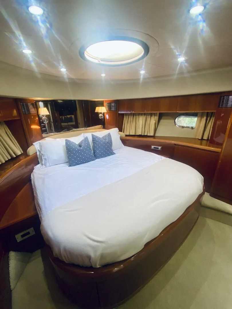 a bed in a room aboard GRAND CRU Yacht for Sale