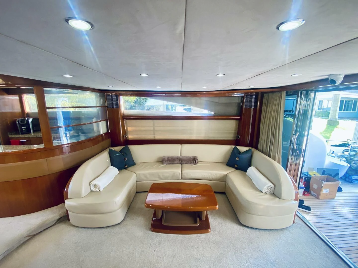 a living room with a large window aboard GRAND CRU Yacht for Sale
