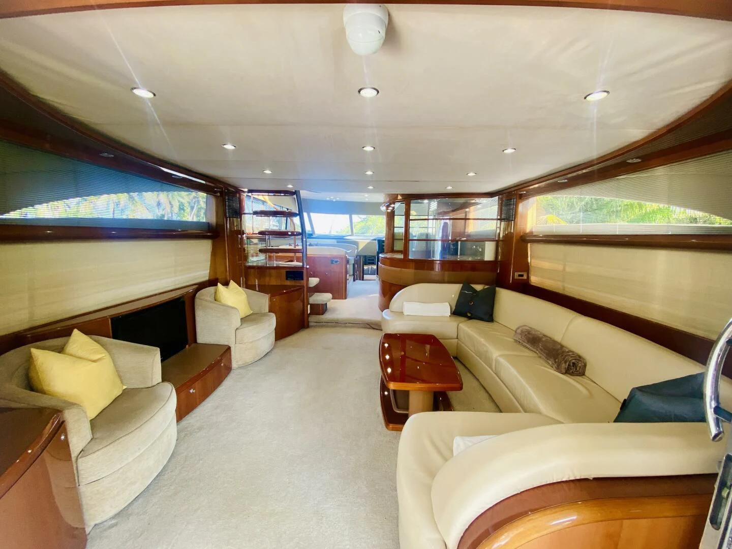 a living room with a large window aboard GRAND CRU Yacht for Sale