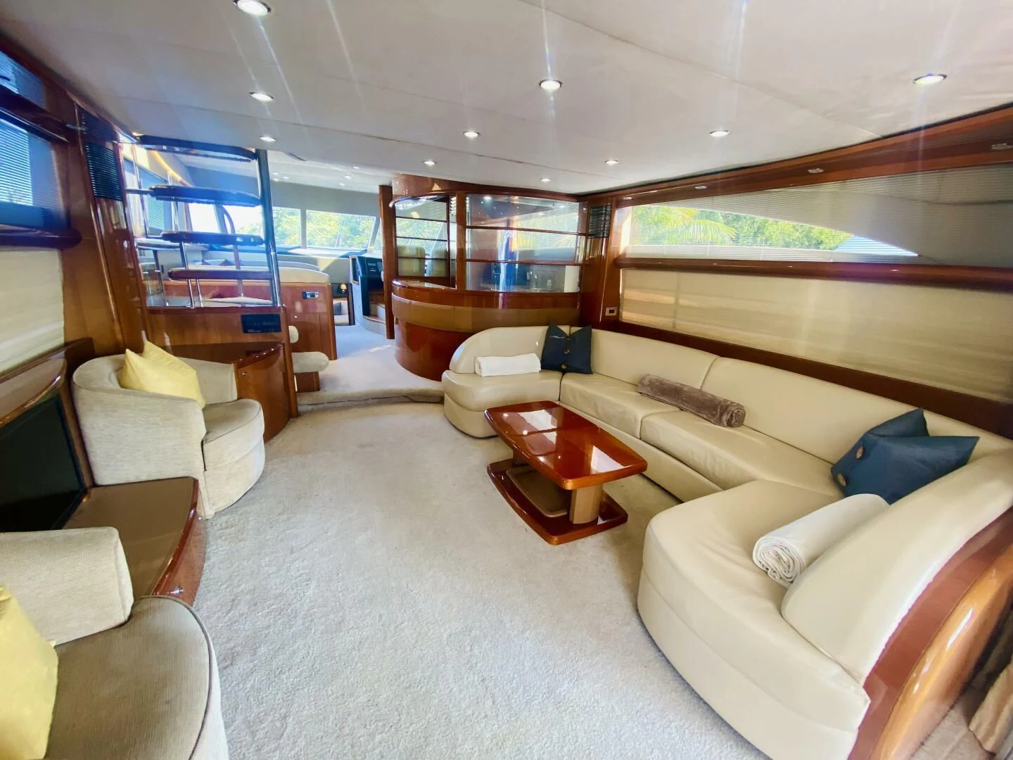 a room with a couch and a table aboard GRAND CRU Yacht for Sale