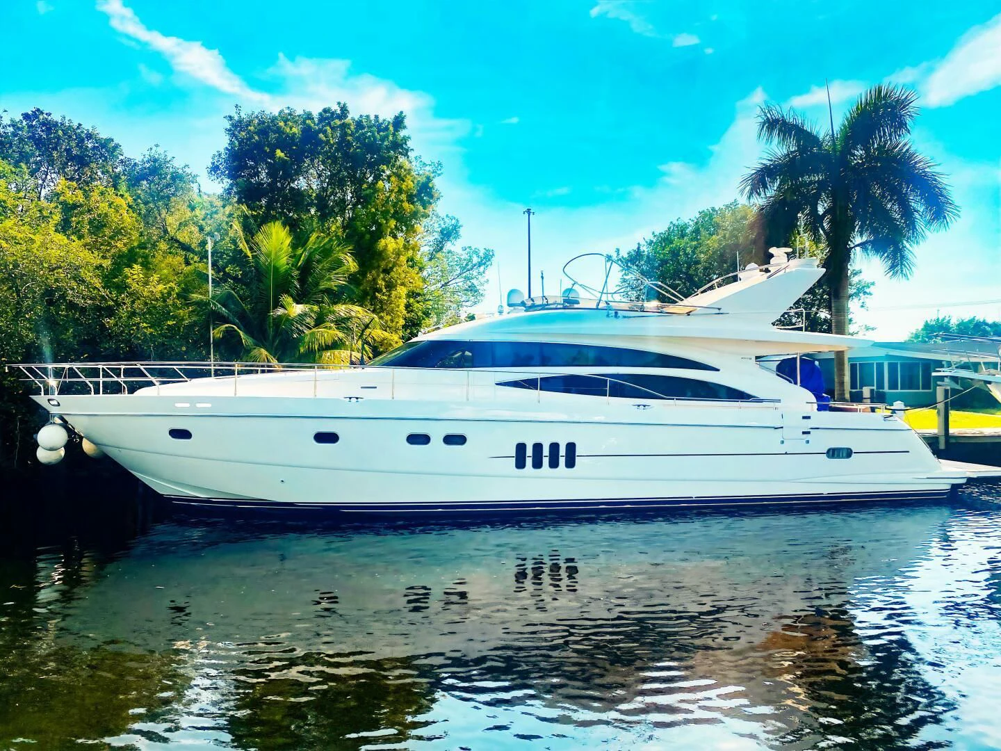 a white yacht on the water aboard GRAND CRU Yacht for Sale