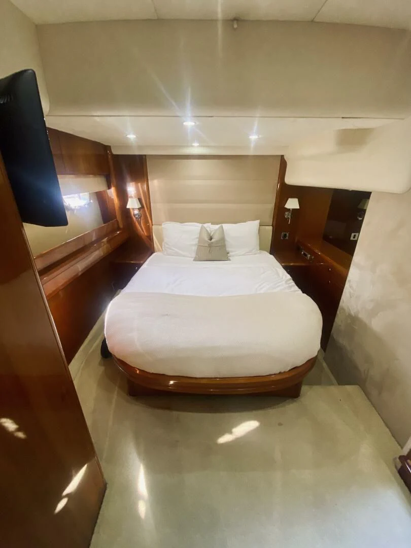 a bed in a room aboard GRAND CRU Yacht for Sale