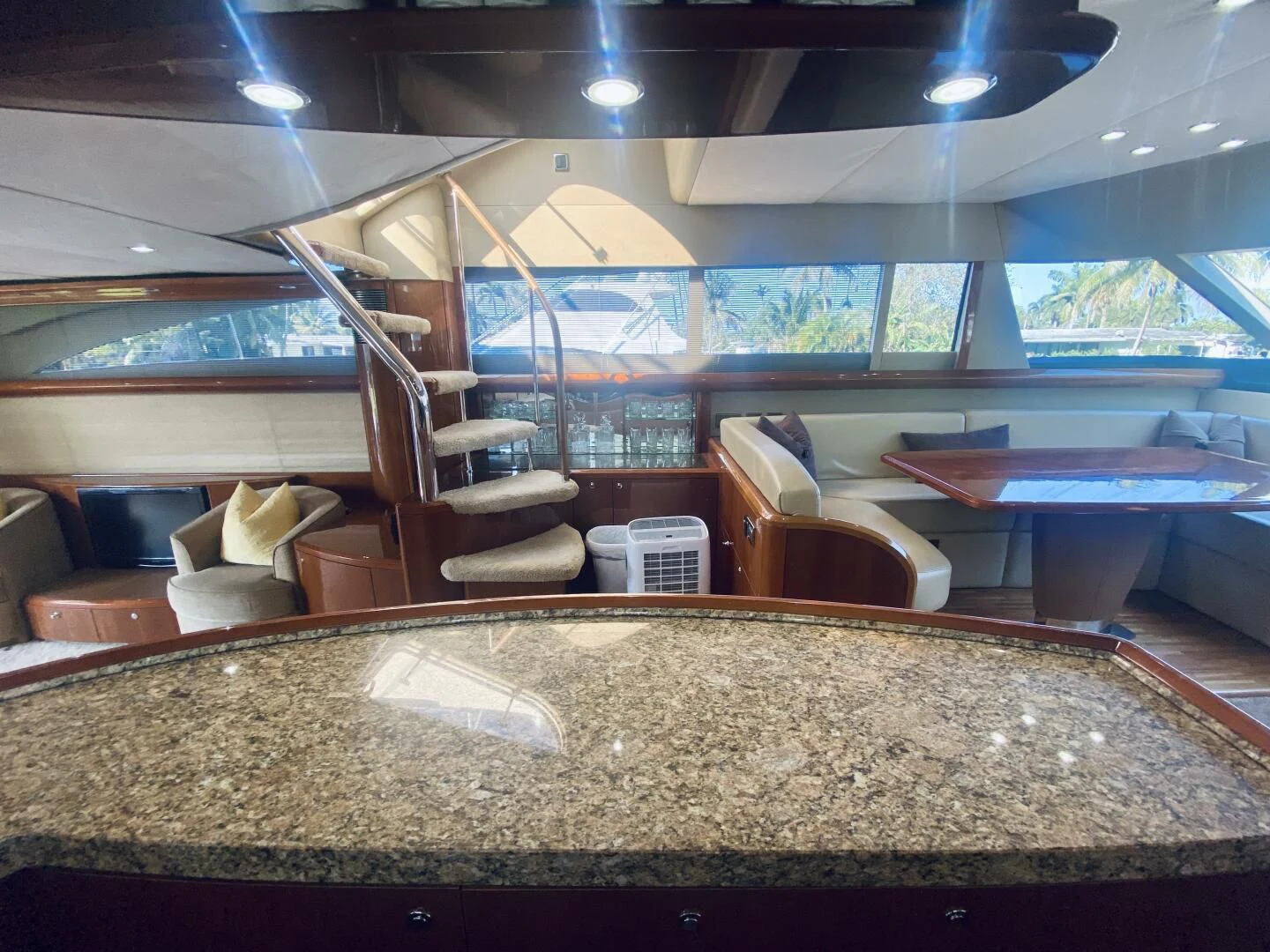 a room with a large bar aboard GRAND CRU Yacht for Sale