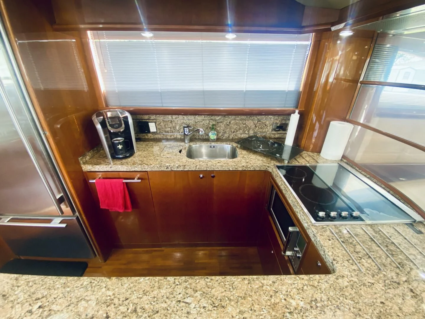 a kitchen with a stove and sink aboard GRAND CRU Yacht for Sale