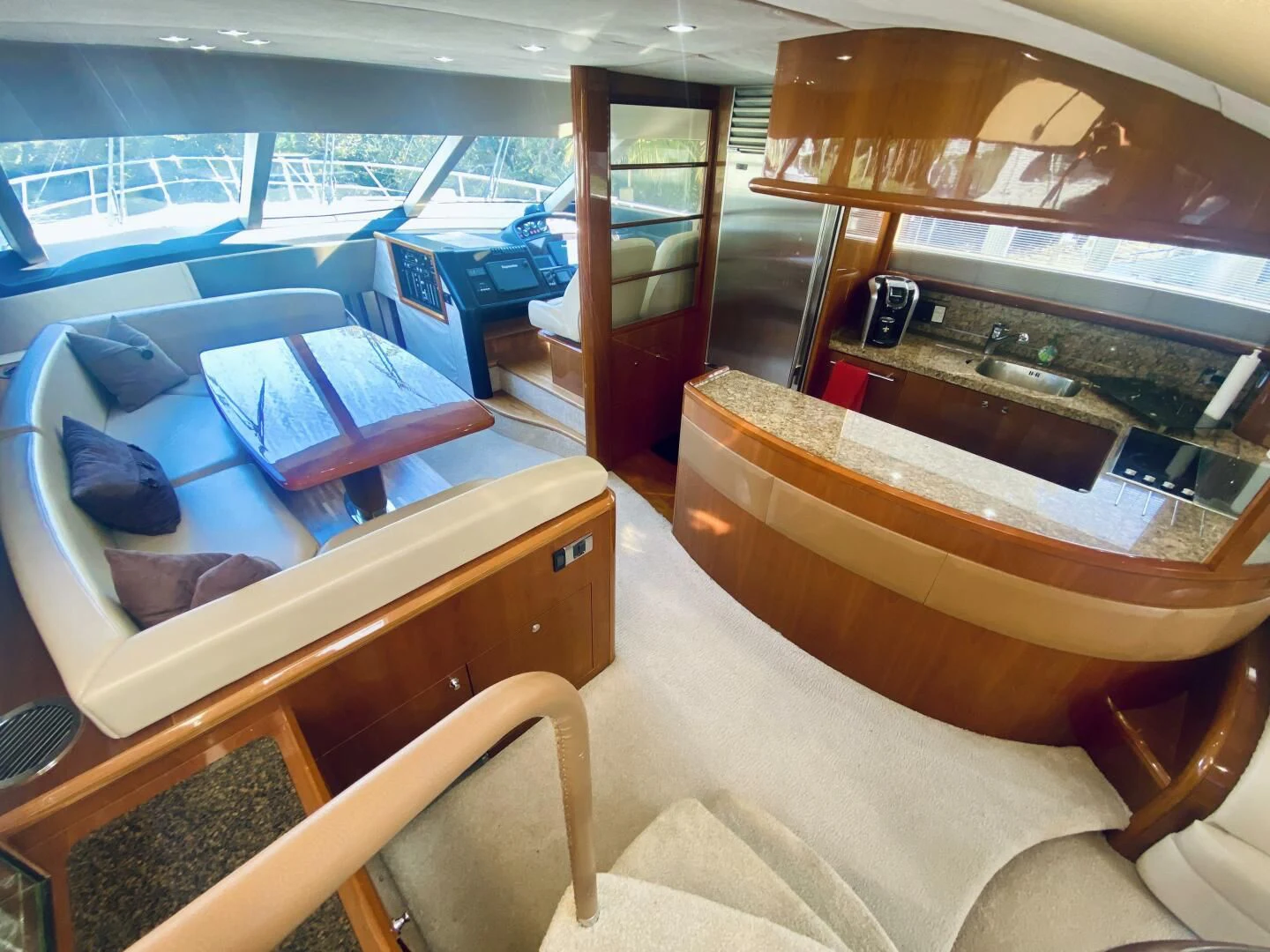 a room with a boat and a bed aboard GRAND CRU Yacht for Sale