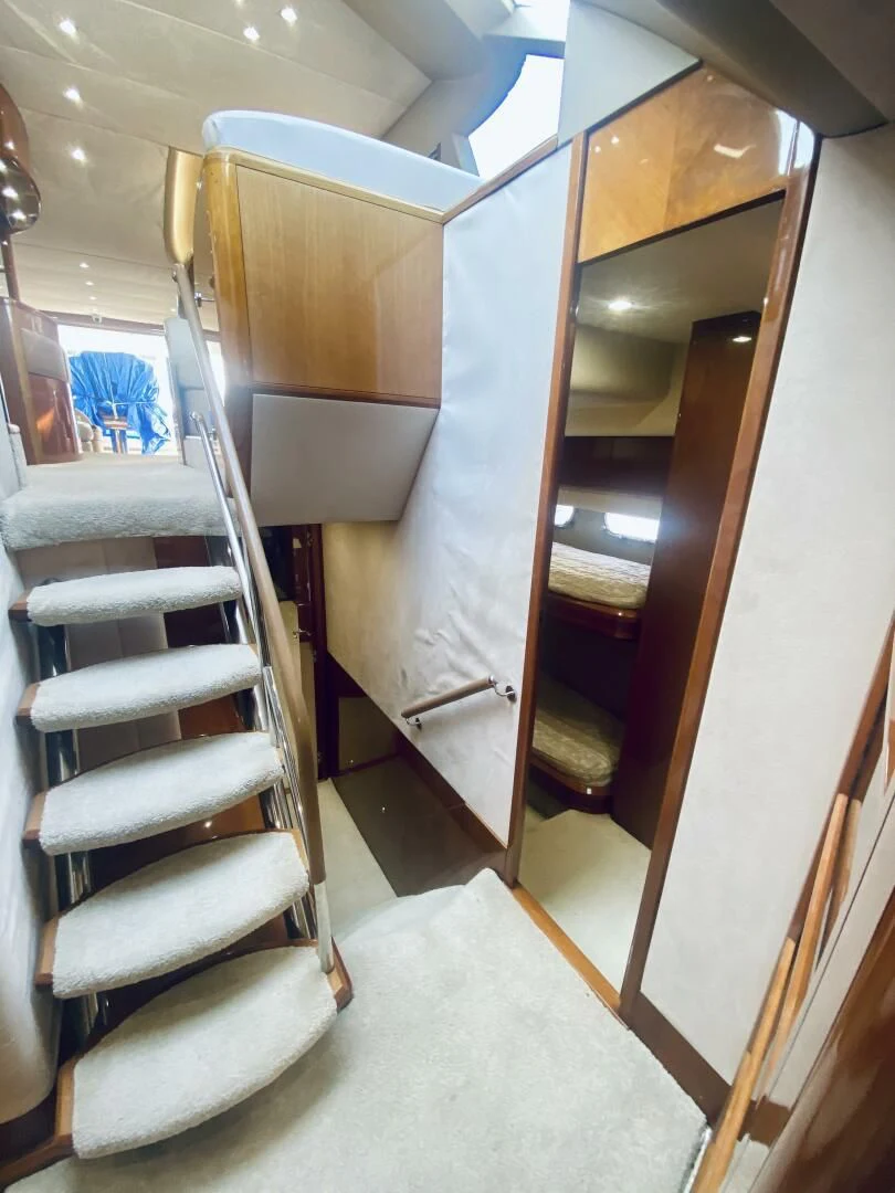 a bunk bed with a white sheet aboard GRAND CRU Yacht for Sale