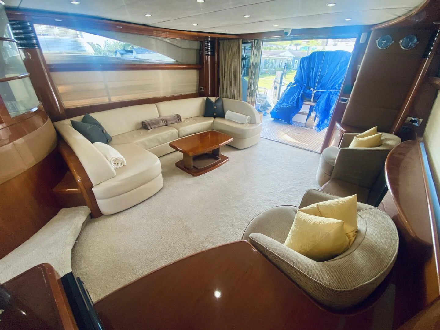 a large living room with a large window aboard GRAND CRU Yacht for Sale