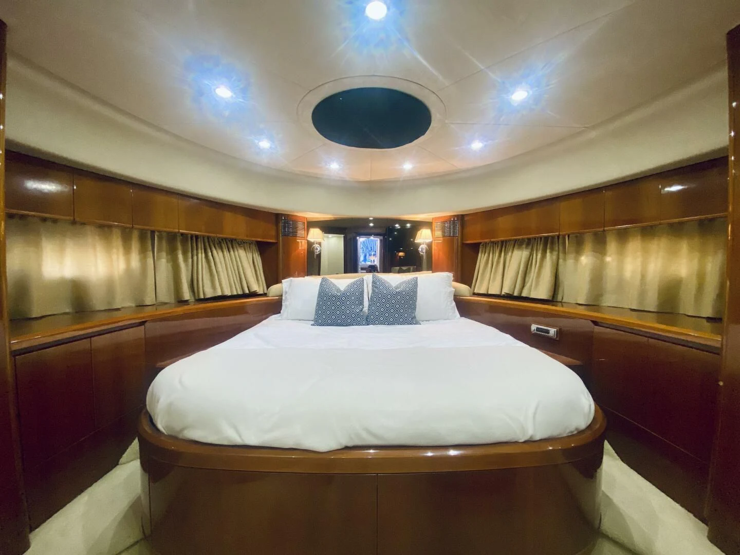 a room with a bed and a window aboard GRAND CRU Yacht for Sale