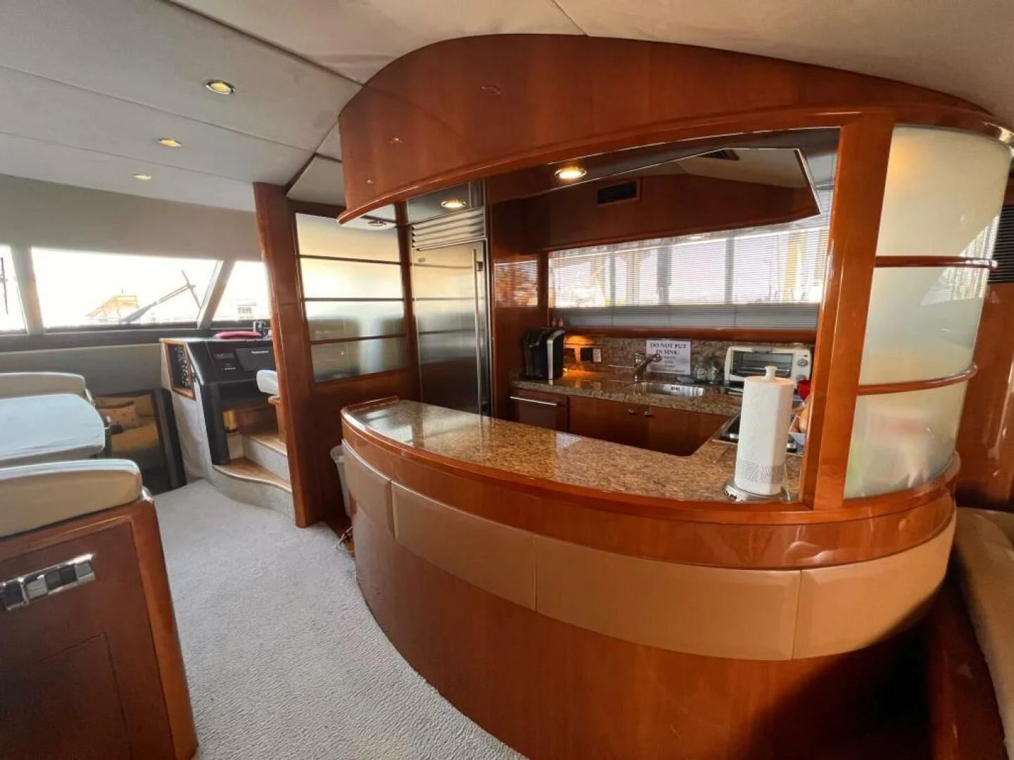a large kitchen with a large counter aboard GRAND CRU Yacht for Sale