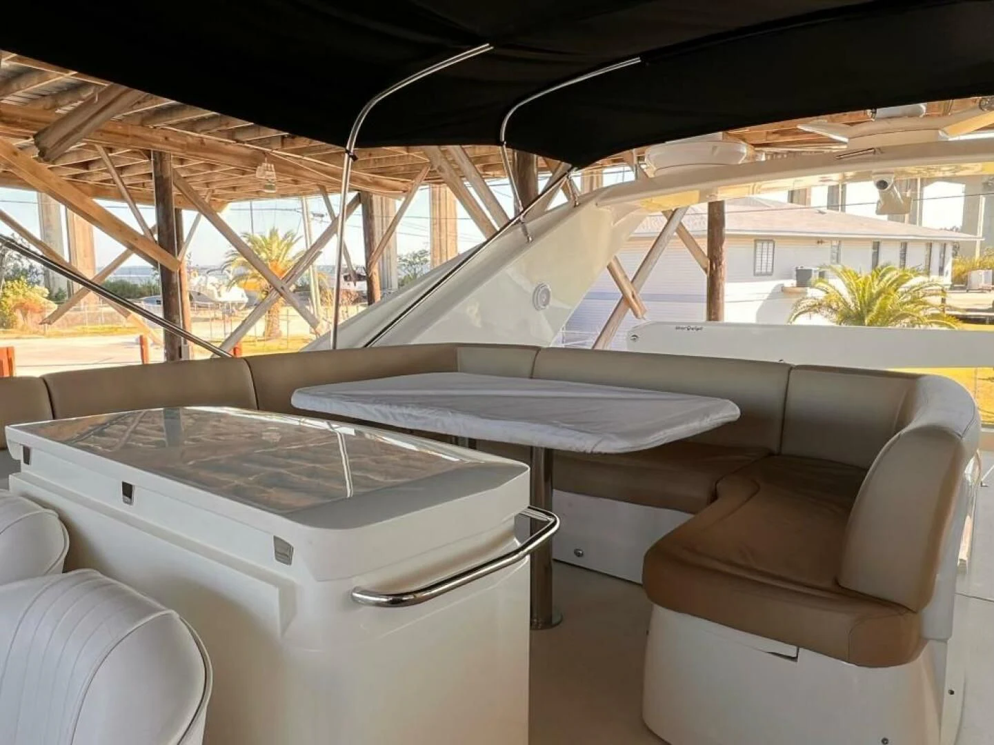 a room with a table and chairs aboard GRAND CRU Yacht for Sale