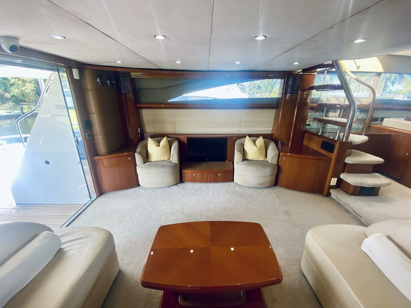 a room with a table and chairs aboard GRAND CRU Yacht for Sale