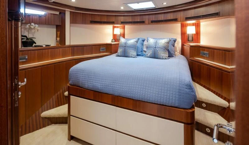 a bed in a room aboard SPILL POINT Yacht for Sale