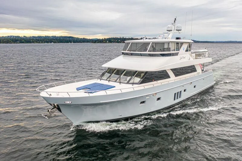 a white yacht on the water aboard SPILL POINT Yacht for Sale