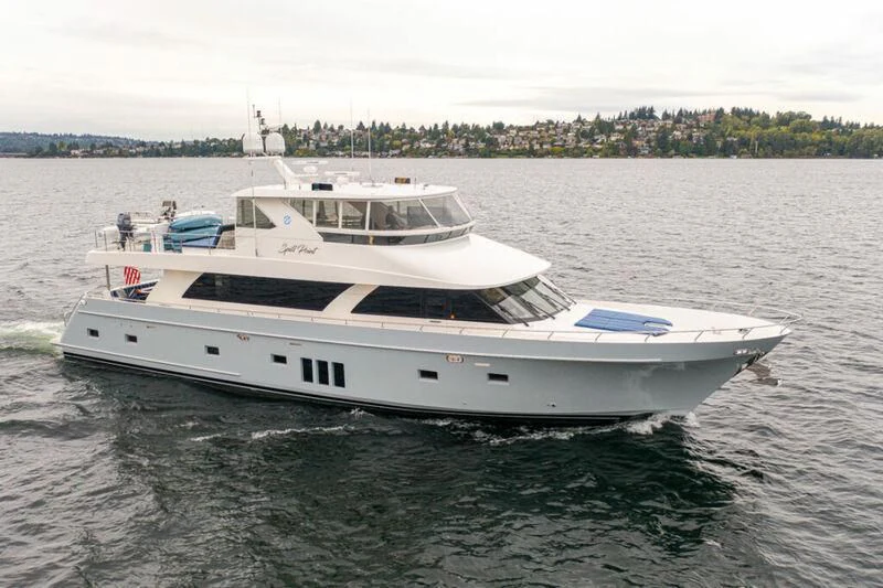 a white yacht on the water aboard SPILL POINT Yacht for Sale