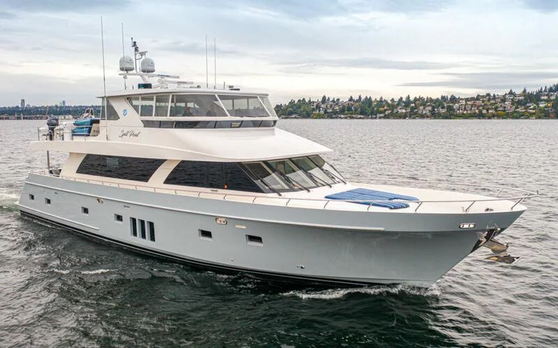 a white yacht in the water aboard SPILL POINT Yacht for Sale