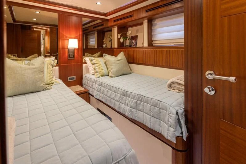 a couple of beds in a room aboard SPILL POINT Yacht for Sale