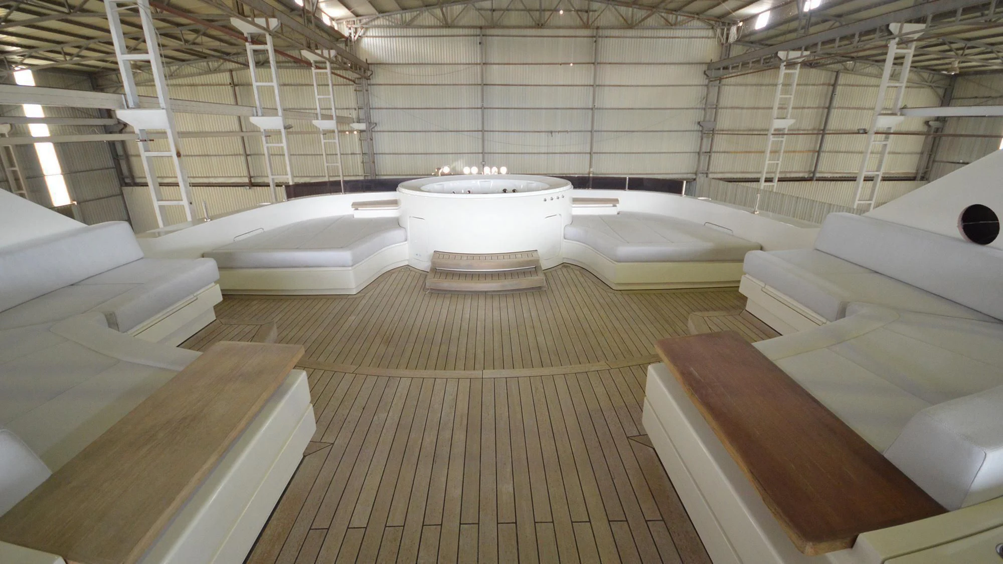 a room with several white sinks aboard NAVIS ONE Yacht for Charter