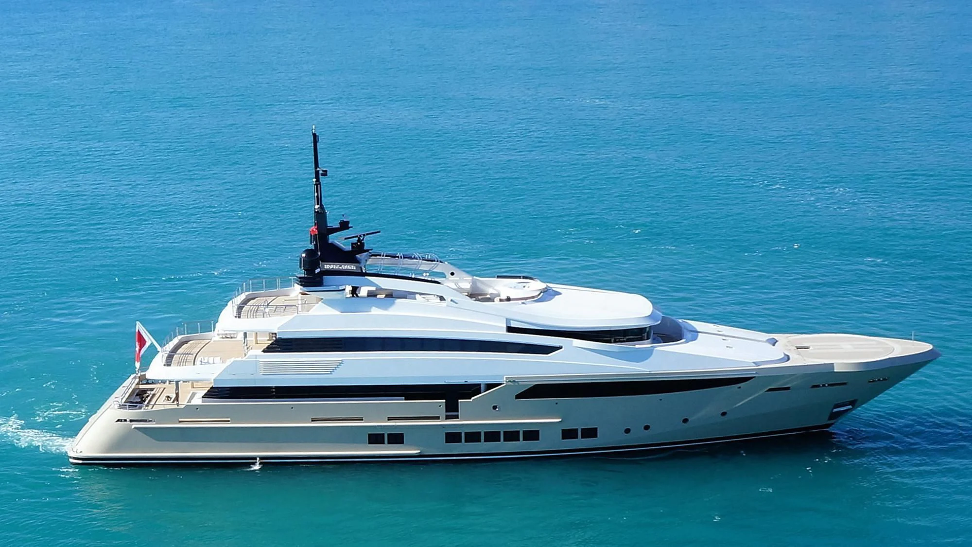 a white yacht in the water aboard NAVIS ONE Yacht for Charter