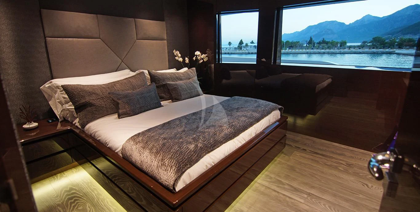 a bed in a room aboard BABA'S Yacht for Sale