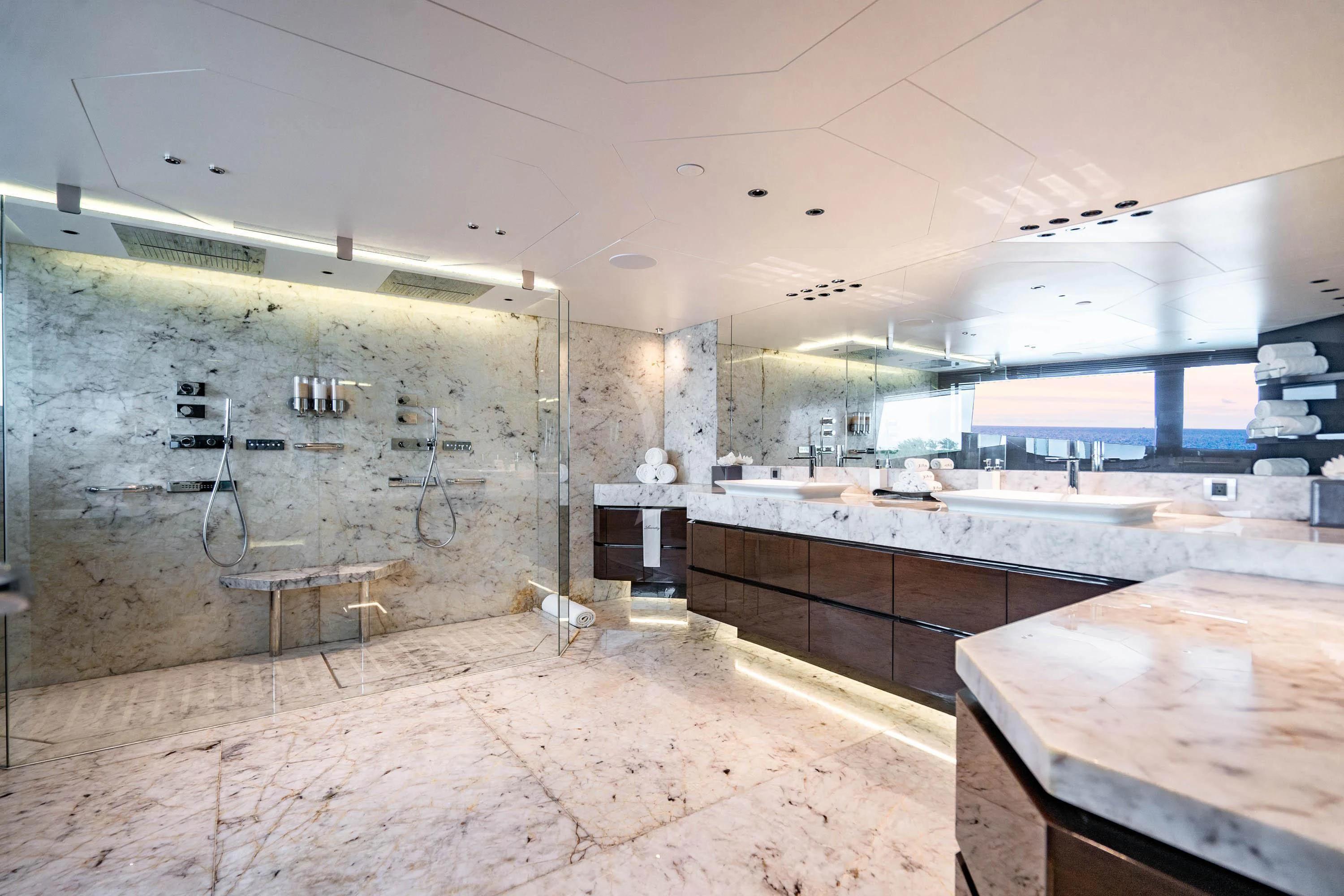 a large kitchen with a large counter aboard BABA'S Yacht for Sale