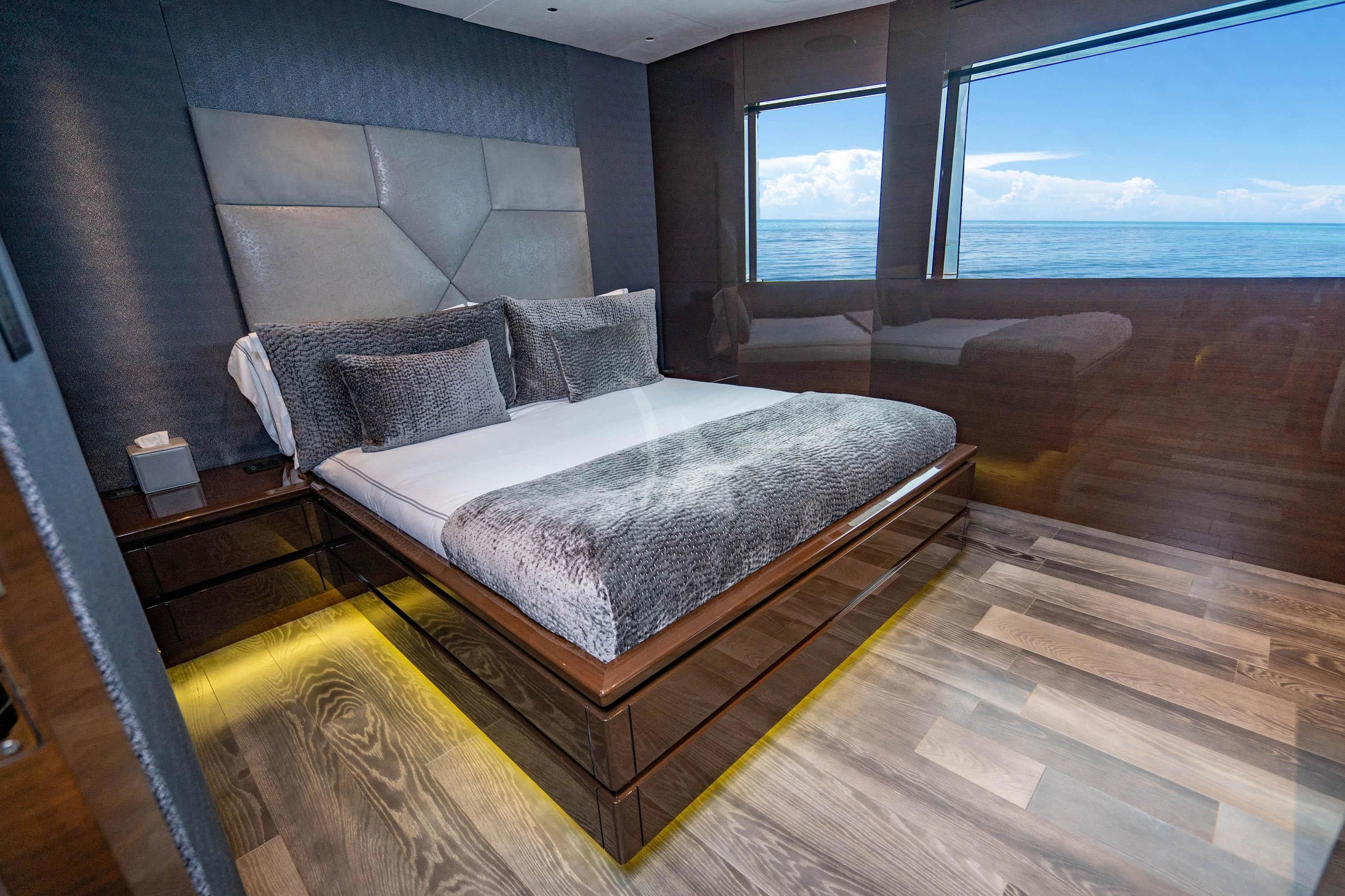a bed in a room aboard BABA'S Yacht for Sale