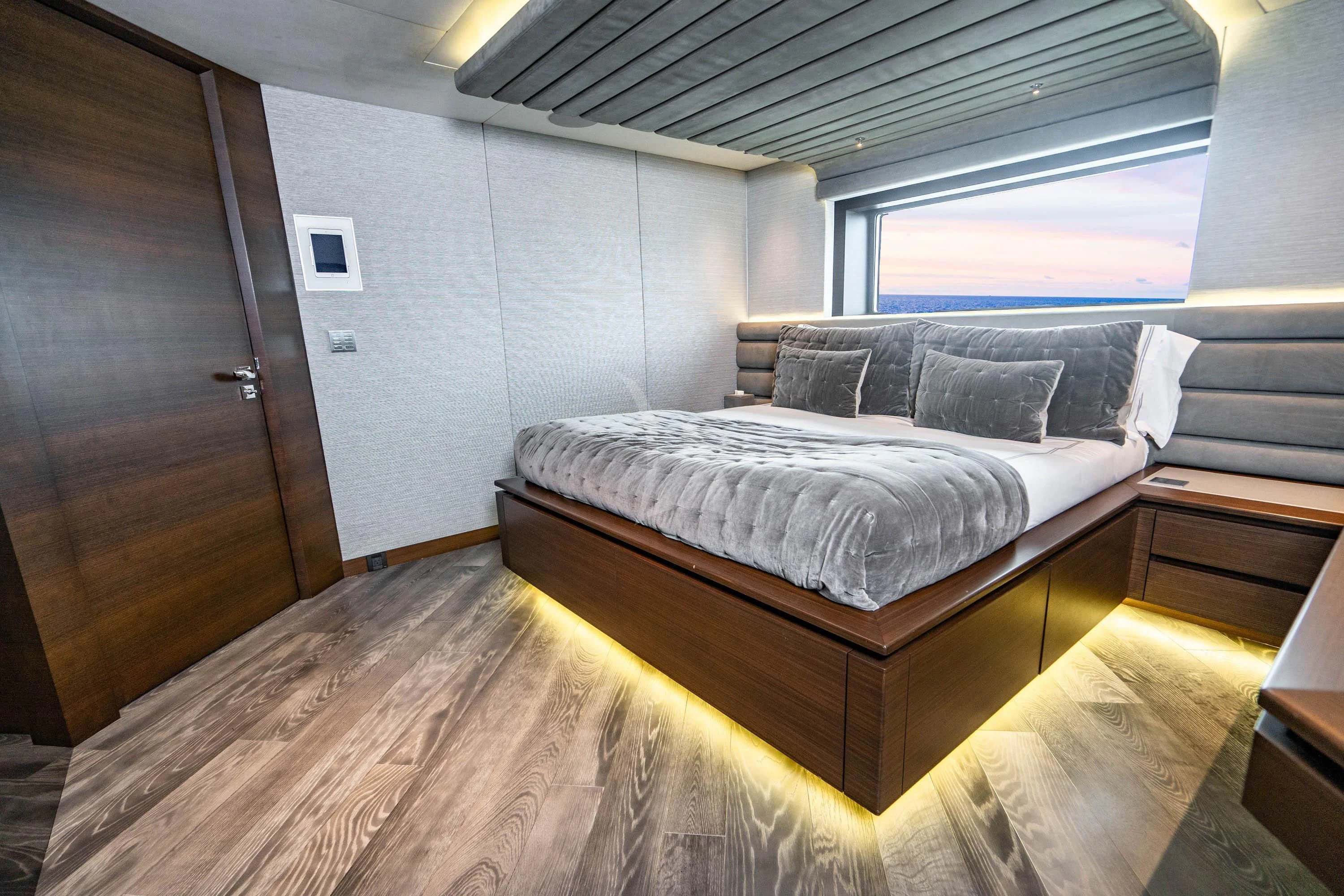a bed in a room aboard BABA'S Yacht for Sale