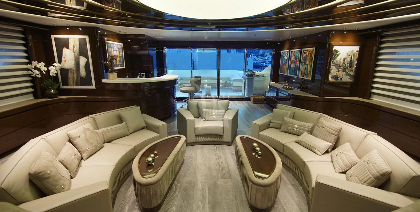 a living room with a large window aboard BABA'S Yacht for Sale