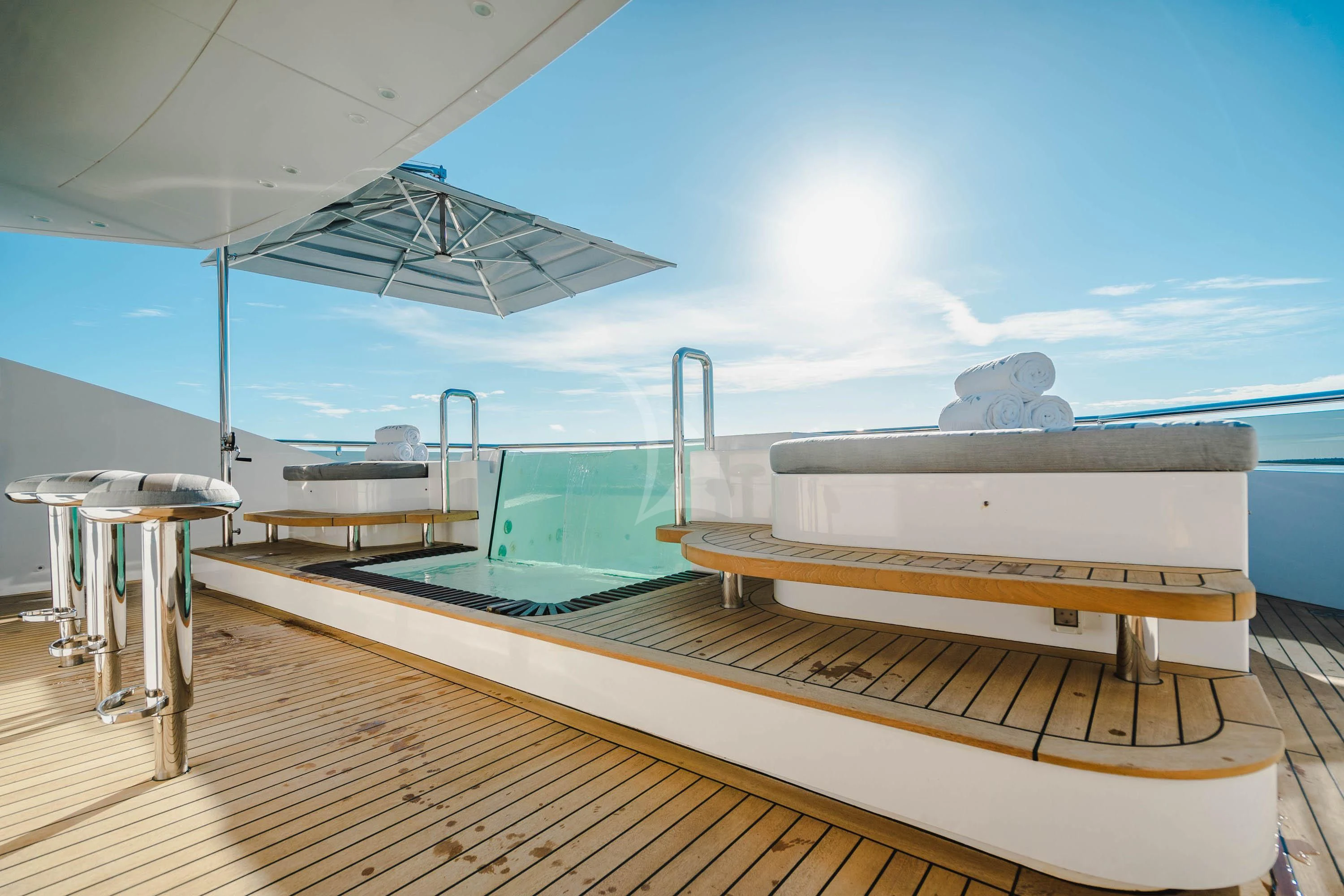 a large metal object on a wooden platform aboard BABA'S Yacht for Sale