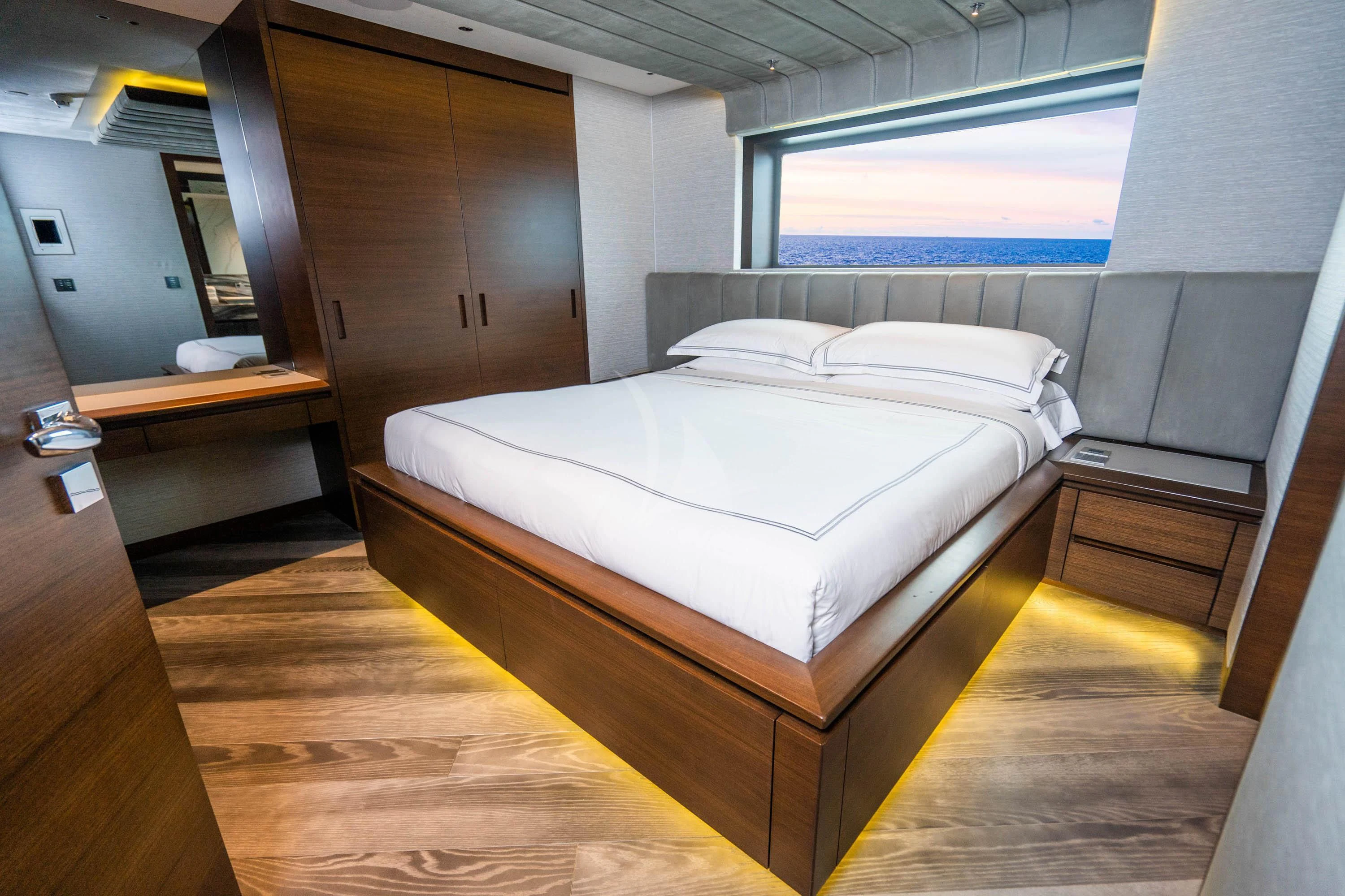 a bedroom with a bed aboard BABA'S Yacht for Sale