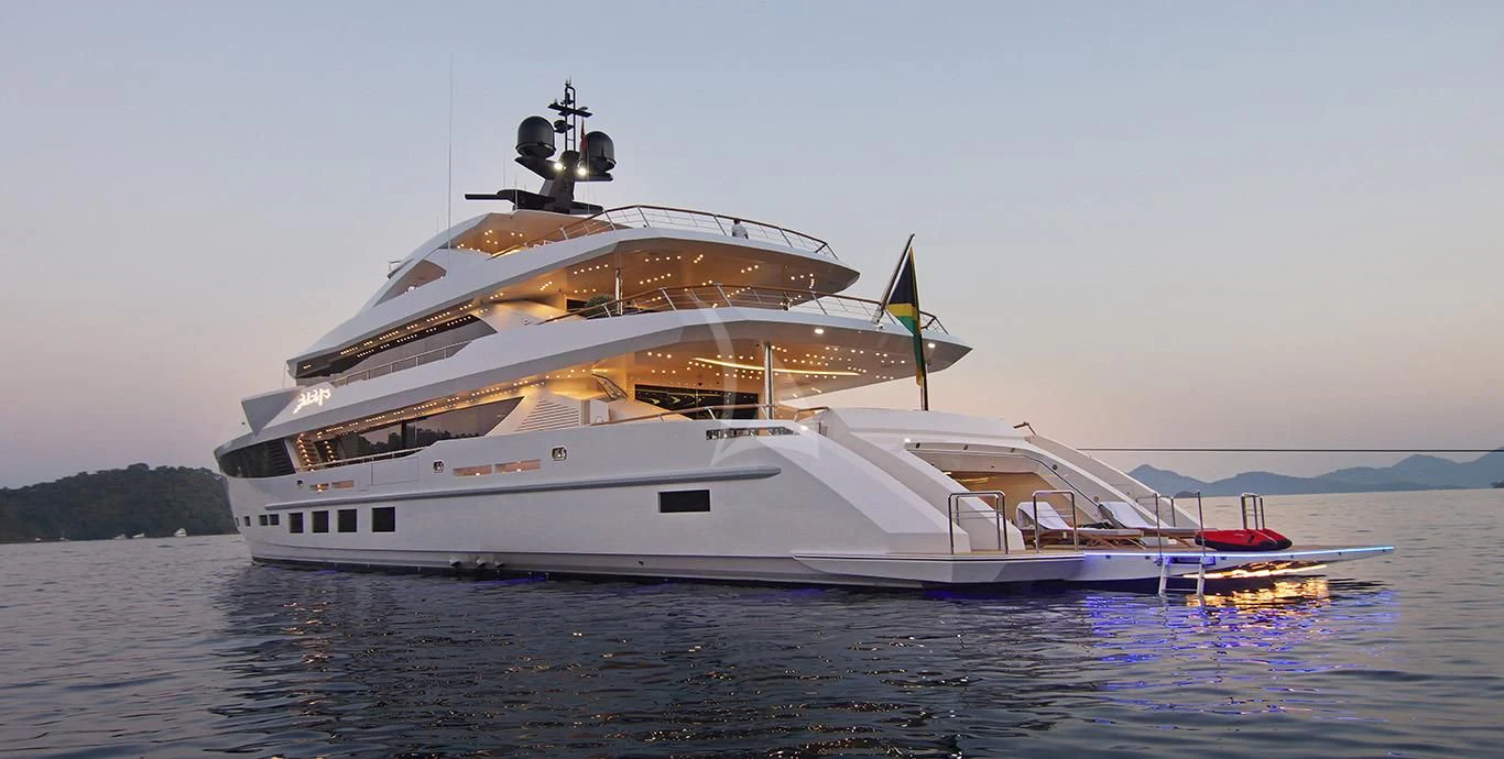 a large white boat on the water aboard BABA'S Yacht for Sale