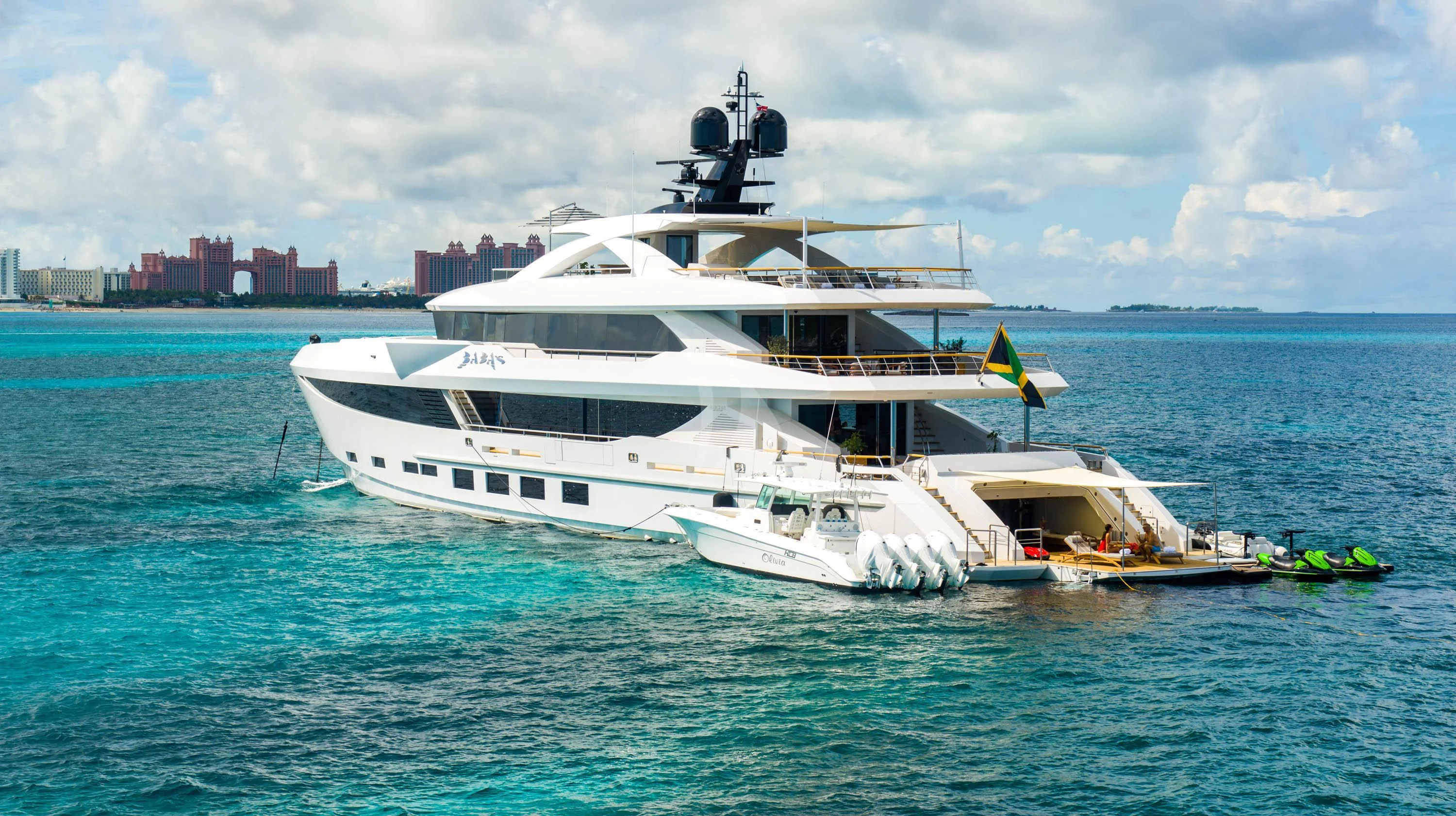 a large white boat in the water aboard BABA'S Yacht for Sale
